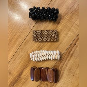 Four elastic bracelets from Africa and Costa Rica. Boho chic! Good Condition!